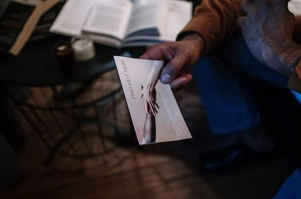 holding a flyer